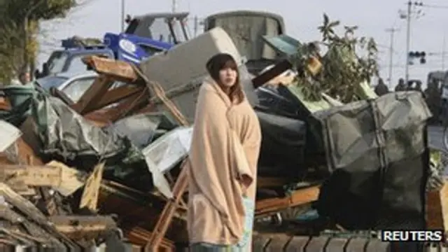 یکی از نجات‌یافتگان سونامی در شهر ایشیماکی ژاپن