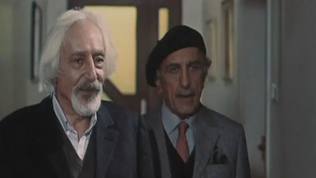 جمشید مشایخی و رضا کیانیان در نمایی از فیلم یک بوس کوچولو ساخته بهمن فرمان آرا