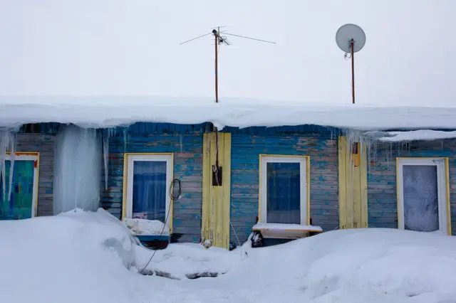 Дом в снегу