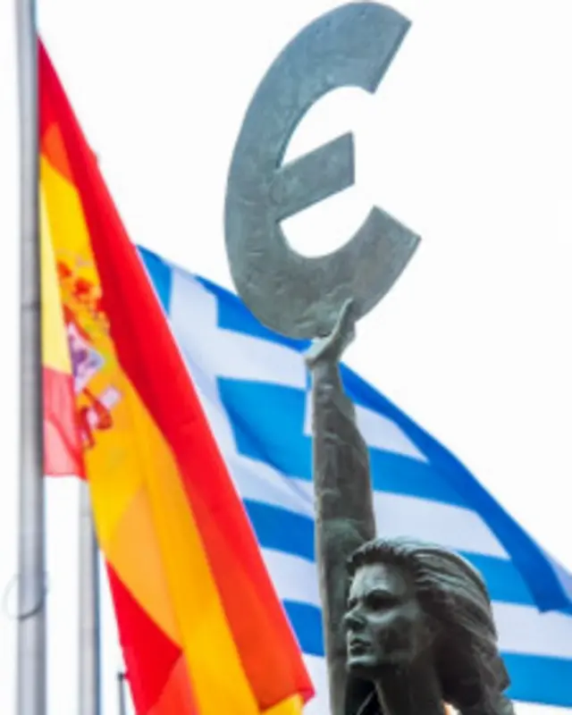 Banderas de España y Grecia.