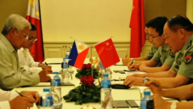 梁光烈與加斯明會談