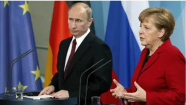 بوتين وميركل