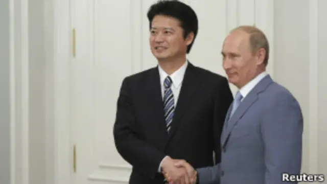 日本外相玄叶光一郎与俄罗斯总统普京