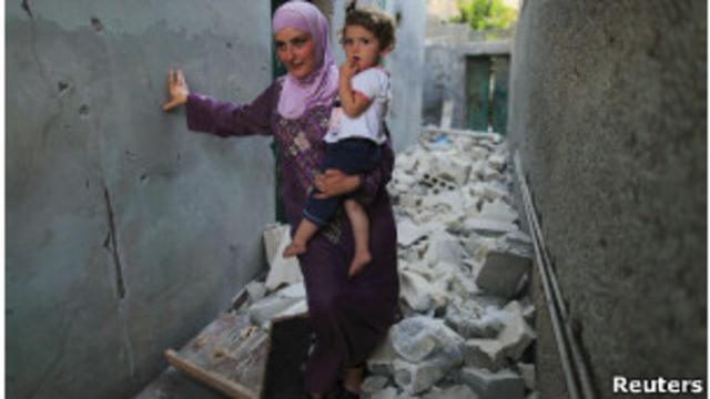 женщина с ребенком в Алеппо