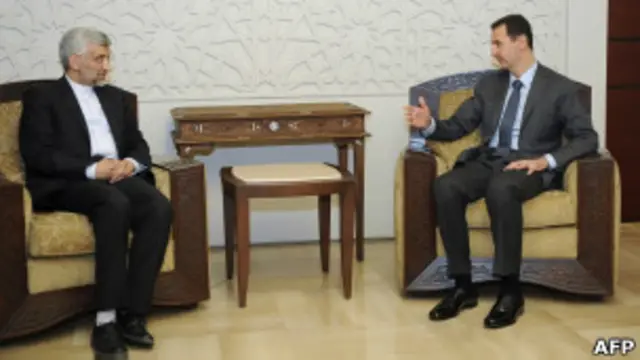 Người đứng đầu ngành an ninh Iran, Saeed Jalili (trái) và Tổng thống Syria  Bashar al-Assad