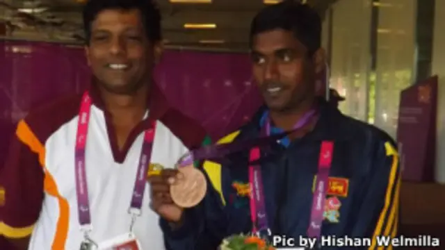 Pradeep Sanjaya (R) with his coach, Jansz Dissaanayake