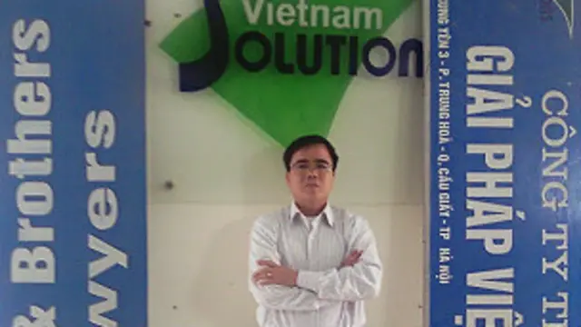 Ông Lê Quốc Quân tại văn phòng của ông trước khi bị bắt