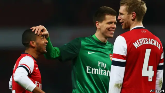 Theo Walcott, Wojciech Szczesny, dan Per Mertesacker.