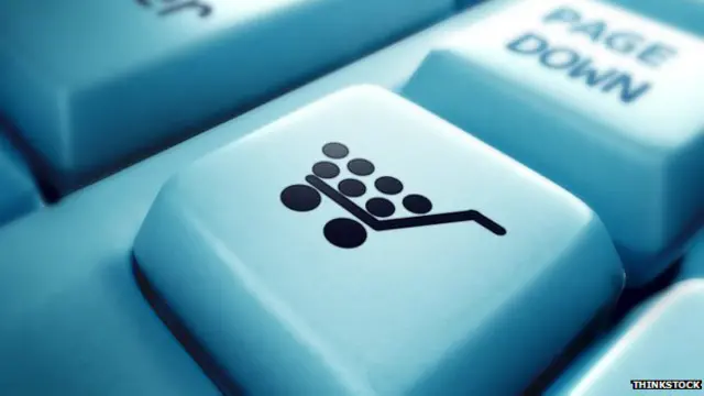 Teclado con tecla de carro de supermercado