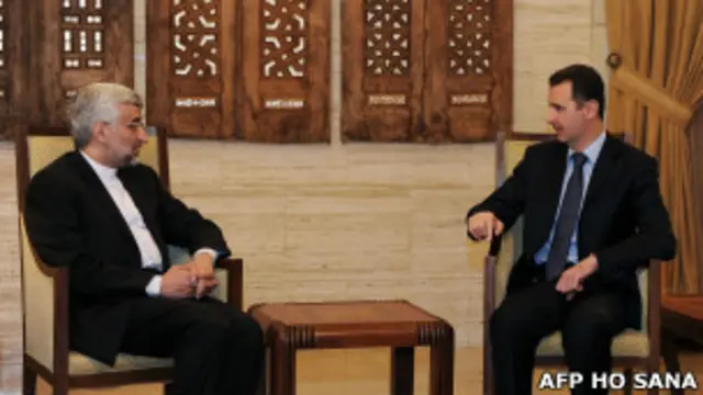 Tổng thống Assad (phải)