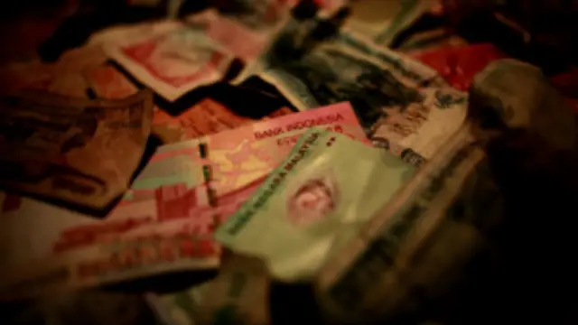 Uang yang disita dari skandal pengaturan hasil pertandingan