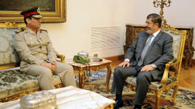 الرئيس مرسي ووزير الدفاع عبد الفتاح السيسي