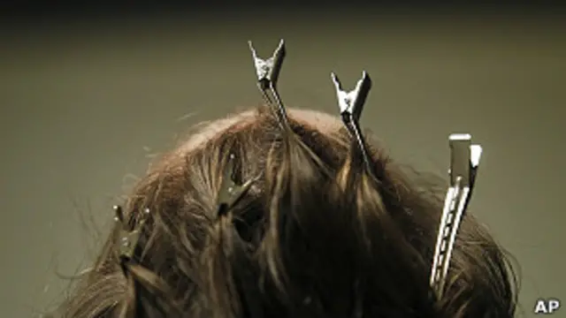 Cabello de una modelo. Foto de archivo