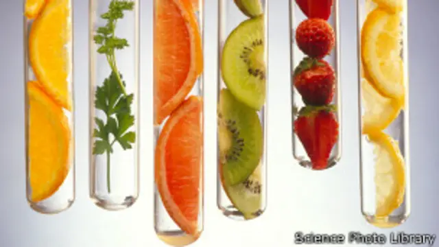 Fruits in tubes, Science Photo Library