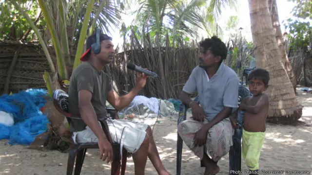 Fishermen leader Geeth Sumith with the BBC's Saroj Pathirana
