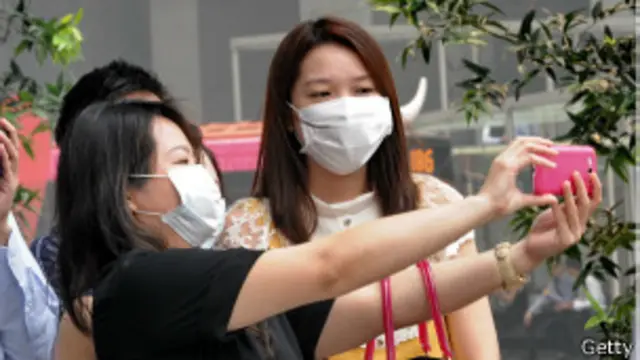 Les Singapouriens se ruent sur les masques jetables pour se protéger de la pollution. 