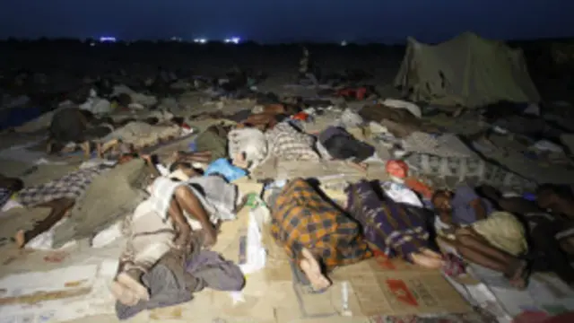 Des migrants, dans un centre d'accueil, à Yaradh, au Yémen