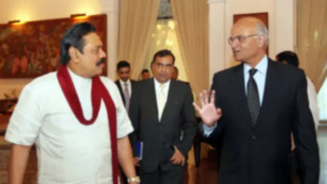 presidient mahinda rajapaksha with advisior menon