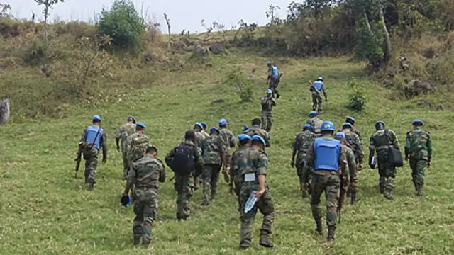 Soldados da ONU sobem a montanhacrash evolution cassinoMuningi (Foto: Luis Kawaguti)