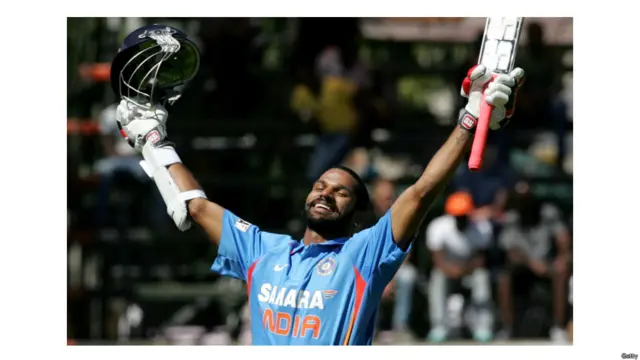 भारतीय बल्लेबाज़ शिखर धवन ज़िम्बाब्वे के खिलाफ दूसरे मैच में अपने शतक की खुशी मनाते हुए. पांच मैचों की श्रृंखला का दूसरा मैच भी भारत ने जीता. 