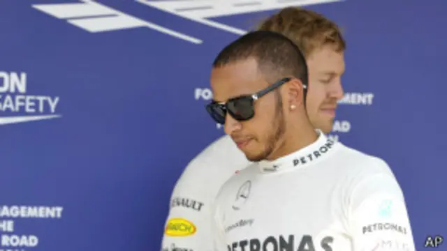 هاميلتون وخلفه فيتل