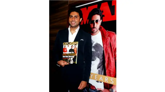 एक मैगज़ीन के लॉँच अवसर पर पोज़ देते अभिषेक बच्चन 