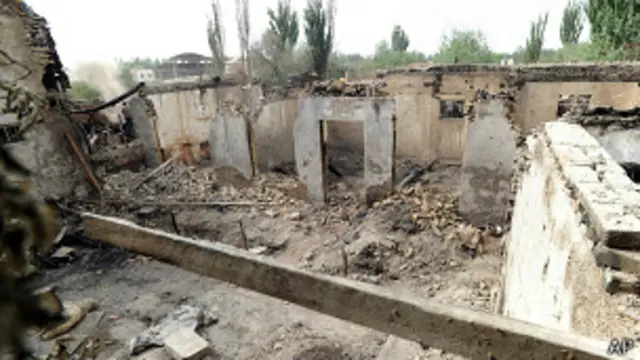 Дом, уничтоженный в результате насилия в Кашгаре