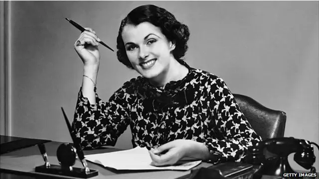 ЖІнка за робочим столом