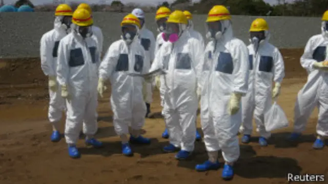 Fukushima workers, Reuters