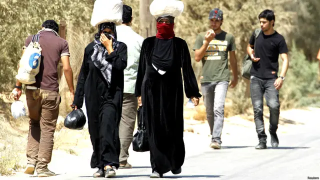 सीरिया में पलायन को मजबूर लोग