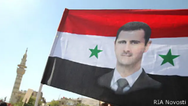 Башар Асад на знамени
