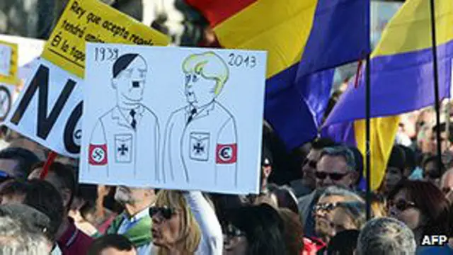 Manifestante en Madrid compara a Merkel con Hitler