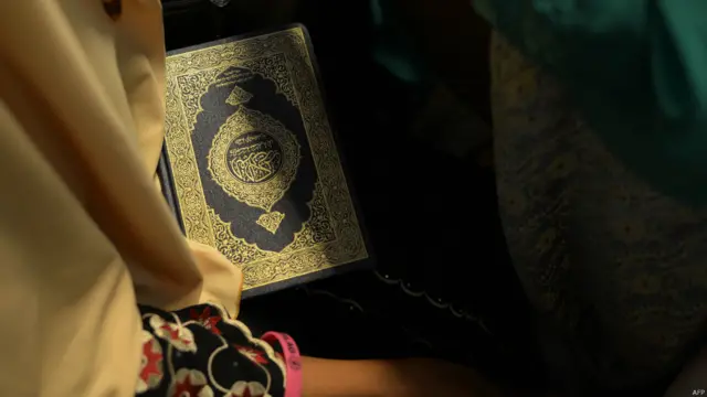 Alquran, Adek Berry/AFP