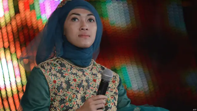 Finalis Muslimah World, Adek Berry/AFP