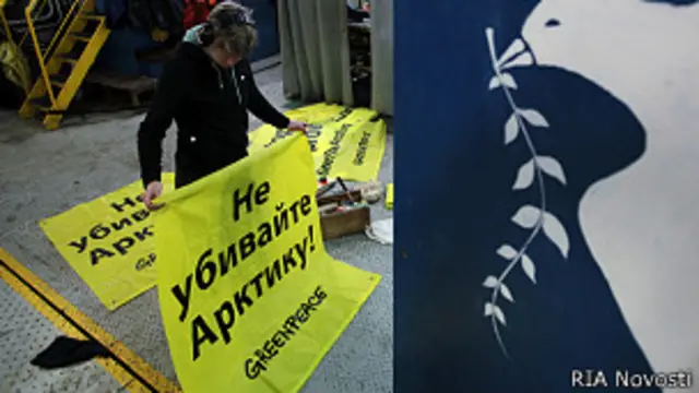 активистка "Гринпис" с плакатом на судне "Арктик Санрайз" 