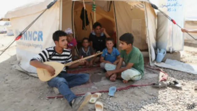 Сирийские беженцы в лагере в Ираке