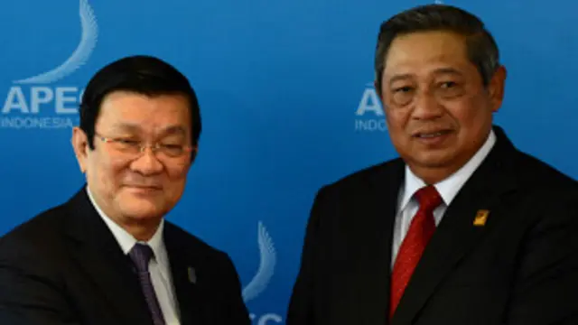 Chủ tịch Trương Tấn Sang (trái) tại APEC