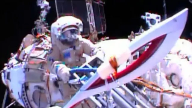 Antorcha olímpica en caminata espacial