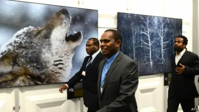 Delegados em Varsóvia (AFP)