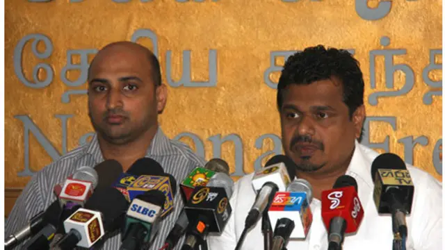 Mohamed Musammil (L) and Dep Minister Weerakumara Disanayake in the press conference