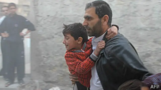 Pai protege filho na Síria