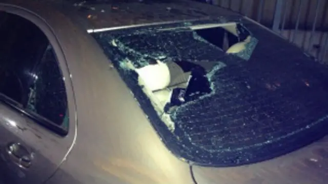 Разбитый автомобиль участника Евромайдана