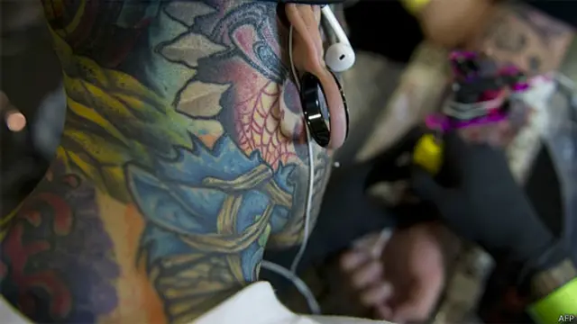 Tatuador (Arquivo/AFP-Getty)