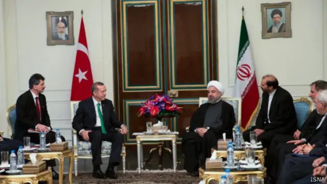 نخست وزیر ترکیه برای اولین بار با حسن روحانی در سمت رئیس جمهوری ایران ملاقات کرده است