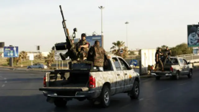 on 17 February 2011, at about 09:15 in the morning, I go on to the rooftop and see 200, maybe 300 protesters outside a police station 
