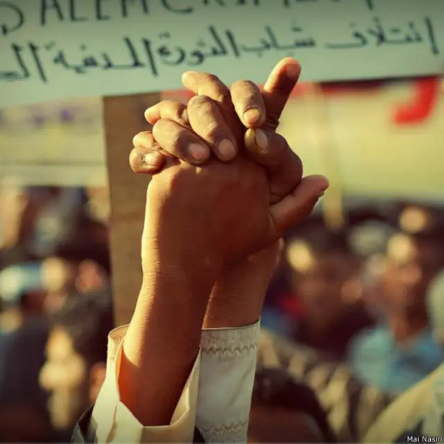 صور من المظاهرات في صنعاء عام 2011 بعدسة مي نصيري.