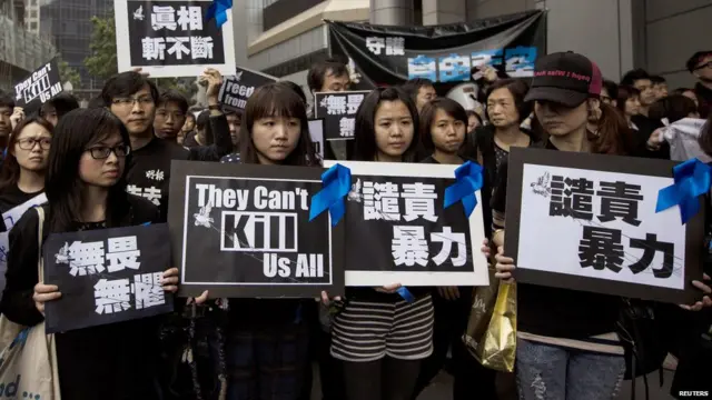 香港新闻界反暴力游行上的年青人（2/3/2014）