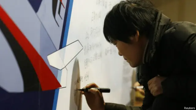 馬航失聯航班中國乘客的家屬在北京為家人祈福（20/03/2014）