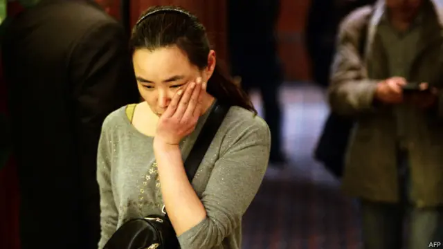 लापता विमान में सवार चीनी यात्री के निराश परिजन