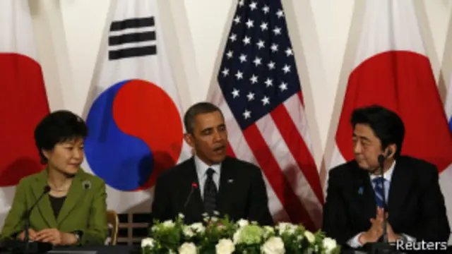 Руководители США, Южной Кореи и Японии в Гааге